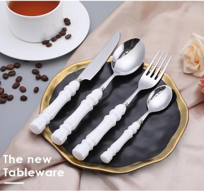 China Sustainable Roman Ceramic Handle Cutlery Set Stainless Steel Cutlery Flatware Sets for sale