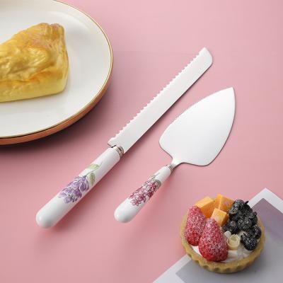 China Viable Custom Stainless Wedding Design Leaf Porcelain Handle Gift Box Knife Cake Server Cake Server Set for sale