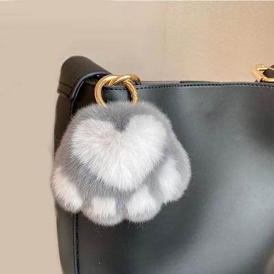 China Plush Rabbit Fur Car Key Chain Bag Ornaments Cat Paw Shape Keychain for sale