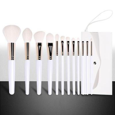 China Manufacturer White 12Pcs Silky Soft Makeup Cosmetic Brushes Kit For Women And Men Basic Profession Makeup Brush Set And Portable Facial Brush for sale