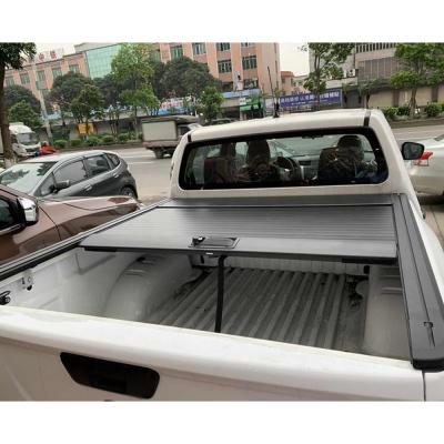 China Wholesale waterproof car accessories pickup electric remote control tonneau covers for nissan navara for sale