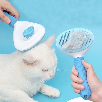 China Sustainable Dog Cats Hair Grooming Deshedding Brush Comb With Self Cleaning Button for sale