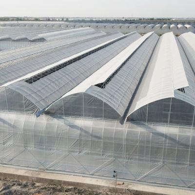 China Agricultural Commercial Grass Greenhouse with Electrical or Water Heating System for sale