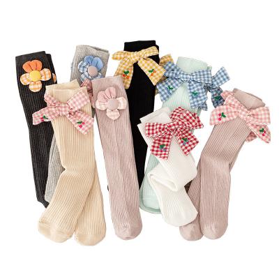 China New Korean Fancy Girls Wholesale QUICK DRY Princess Flower Bows Sweet Bangs Comfortable Calf Solid Color Cotton Mid Girls Slouch Socks for sale