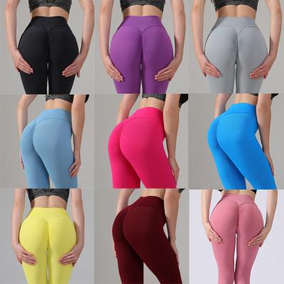 China 2022 Europe 11 Colors Breathable Available Sexy Hip Honeycomb Yoga Pants Solid Color High Waist Fitness Yoga Gaiters for sale