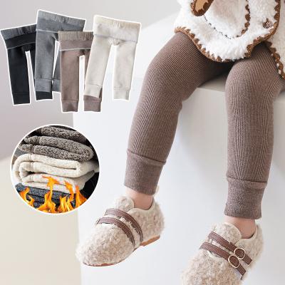 China Solid Color Fuzzy Warm Baby Color Fade Proof Winter Cashmere Thermal Thick Warm Kids Fluffy Pants Cozy Leggings for sale