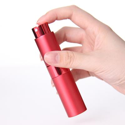 China Eco-friendly Twist Empty Atomizer Refill Tube Aluminum Glass Perfume Bottle for sale