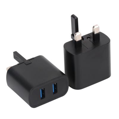 China Dual Port 12w Cell Phone Wall Charger Travel Charger 2.4a UK Multi Port Plug For iPhone Charger for sale