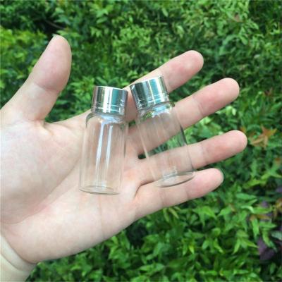 China Empty Transparent Clear Liquid Gift 2ml Mini Glass Bottles Screw Silver Cap Gift Container Wishing Bottle Jars Customized Bottle for sale