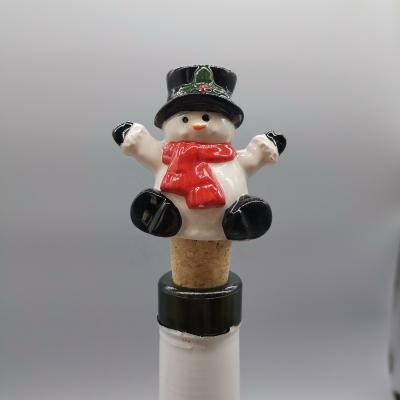 China Christmas Snowman Design Christmas Snowman Shape Ceramic Wine Bottle Stopper Wine Stopper For Christmas Party for sale