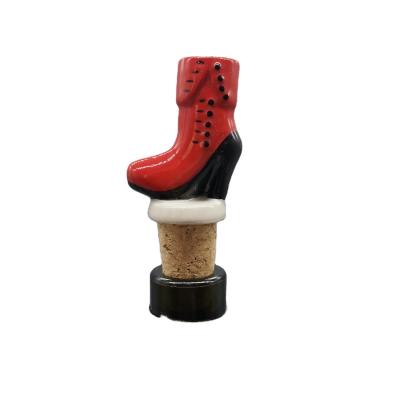 China Custom Ceramic Wine Bottle Stopper Christmas Boot Shape Christmas Boot Shape Ceramic Wine Stopper For Christmas for sale