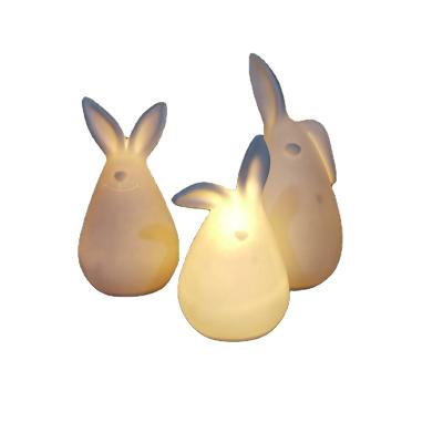 China Rabbit Design Factory Pirce Fine Bone China Ceramic Easter Bunny Decorations With LED Light For Easter Day for sale