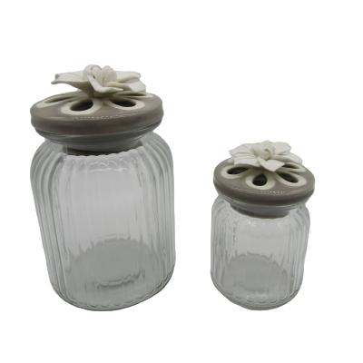 China Cheap Freshness Storage Wholesale Storage Glass Jar With Handcraft Ceramic Flower Glass Cookie Jar For Restaurant for sale