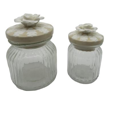 China Freshness Preservation Factory Price Glass Storage Jar with Handcraft Ceramic Flower Glass Cookie Jar for Restaurant for sale