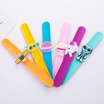 China Factory promotion cartoon children's toys pat the ring bracelet astronaut the elements pat the ring for sale