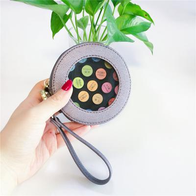 China Fashion Round Design PU Leather Hard Shell Essential Oil Carry Case Around Shape Portable PU Essential Oil Bag With Handle for sale