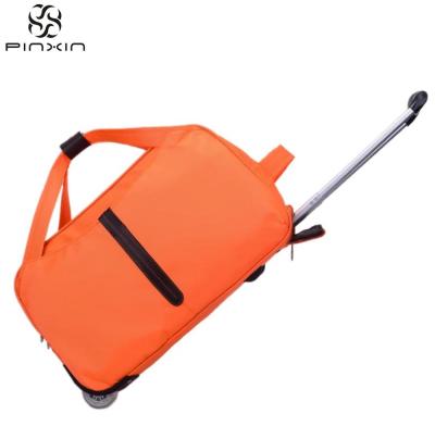 China Water Resistant Fashion Travel Rolling Duffel Bag Trolley Outdoor Travel Luggage Bag With Wheels for sale