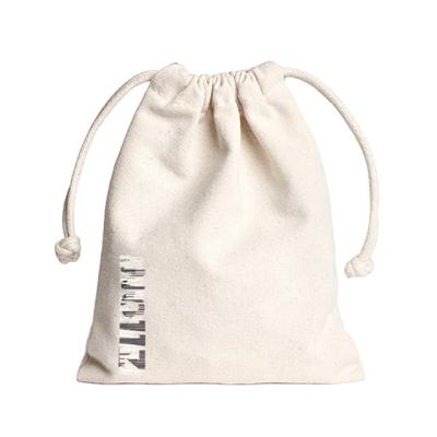 China 100% Eco-friendly 100% Cotton Muslin Drawstring Bag Canvas Cotton Drawstring Bag Footprint Cotton Drawstring Fabric Large Bags for sale