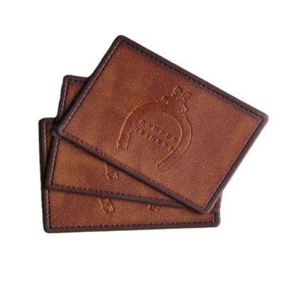 China Viable Customized Main Brand Label PU Logo Embossed Leather Labels For Jeans Clothing Wholesale for sale