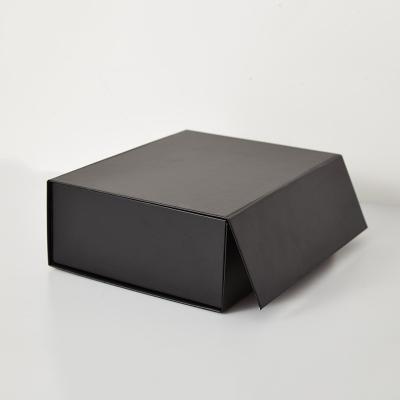 China Wholesale OEM Luxury Gift Package Magnet Foldable Clothing Paper Box With Ribbon for sale