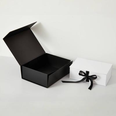 China Custom Clothing Folding Gift Box With Ribbon , Magnetic Rigid Boxes for Dresses for sale