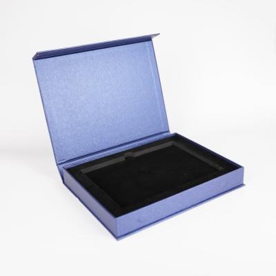 China Custom Logo Blue Clamshell Storage Boxes Gift Book Shape Packaging Box With EVA Tray for sale