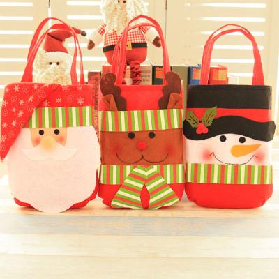 China Eco-friendly Materials Wholesale Nonwoven Christmas Home Hanging New Style Christmas Candy Bag For Party Decoration for sale