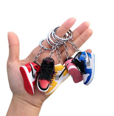 China Cute Keychains Wholesale 3D Mini Sneakers Plastic Shoes Basketball Shoes Key Chain Models for sale