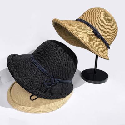 China Striped Women Beach Sun Straw Hat Travel Foldable Brim Summer UV Bucket Hat With Black Band for sale