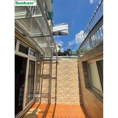 China Anti-UV Outdoor Terrace Roof Awning Sheet Polycarbonate Balcony Aluminum Patio Cover for sale