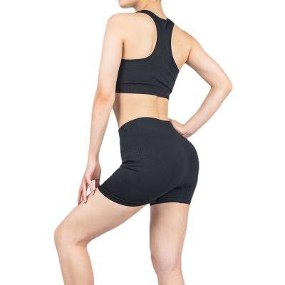 China Breathable mesh women gym breathable shorts set racerback sports bra and shorts yoga athletic set wholesale for sale