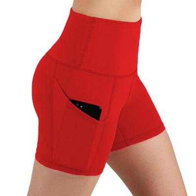 China 2021 New Sports Equipment Shorts Women High Waist Breathable Yoga Pants Tight Shorts With Phone Pocket Wholesale for sale