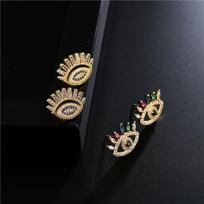 China Fashion Punk Gold Bohemian Earrings Eye Elements Personality Zircon Stud Copper Micro-inlaid Earrings for sale