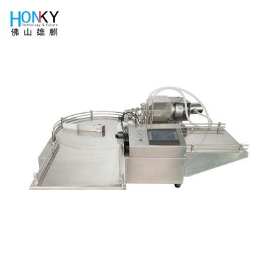 Chine Machine de remplissage de liquide semi-automatique de bureau avec fonction d'alimentation de bouteille pour le remplissage de bouteilles de petit volume à vendre