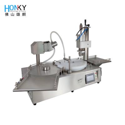 China Semi Automatic 25 BPM 10ml Vial Filling And Capping Machine With Vial Crimping Function For Essential Oil Filling for sale