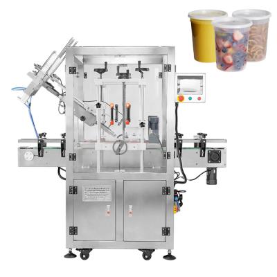 China Automatic Grocery Beverage Container Lid Capping Machine Food Tub Snap On Cap Machine for sale