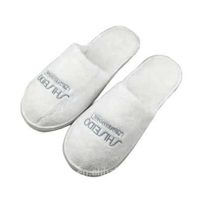 China 3-5 Star Anti-Slip/Soft/Breathable White Coral Fleece Custom Logo Hotel Slippers for sale