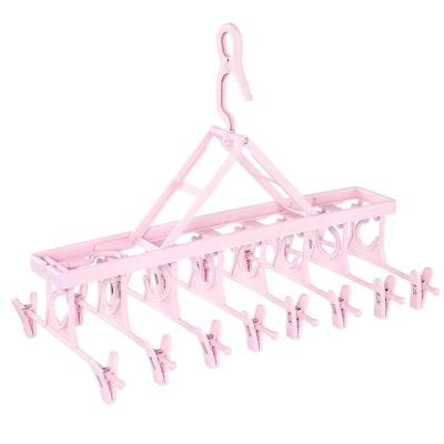 China For Multi Function Clothes Folding Clothing Hangers Plastic Pants Skirt Hanger Organizer for sale