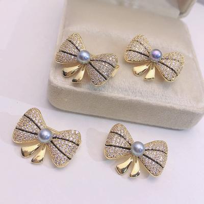 China Vintage/Elegant Haiyang 2021 fashionwholesale new butterfly custom seawater pearl luxury brooches pins for women for sale