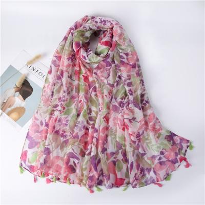 China Luxury cheap fringed viscose printed scarf looks good for keeping warm women scarves and shawls for sale