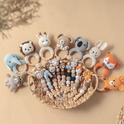 China Soft Organic Newborn Baby Gift Set Rabbit Lion Teddy Bear Elephant Fox Wooden Rattle 2 Pcs Crochet Animal Rattle Pacifier Clip for sale