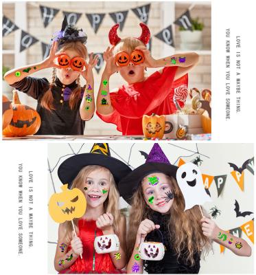 China Temporary Halloween Ghost Festival Fluorescent Cartoon Tattoo Sticker Face Glow Pumpkin Children Tattoo Stickers for sale