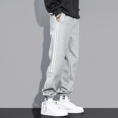 China Gray Anti-Static Side-Buttoned Sweatpants Men's Loose Thickened Drawstring Casual Pants Knitted Sweater Pants for sale