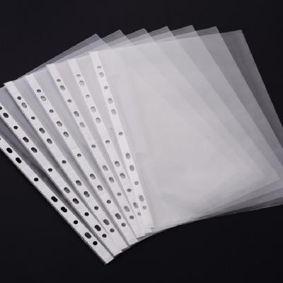 China Eco - Friendly Durable 11 Holes Custom A4 Sheet Transparent Soft Surface Protector Punched Pockets for sale