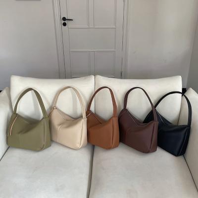 China Water Resistant Take the 2022 Korean version of the simple new style stitching portable zipper armpit bag zipper ins wind dark bag one shoulder for sale