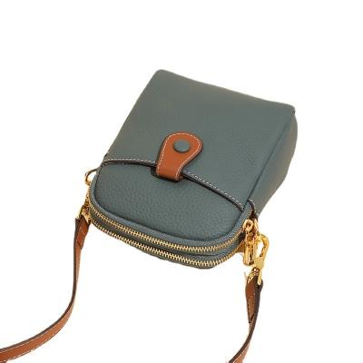 China Water Resistant 2022 new niche first layer cowhide mobile phone bag women's messenger small bag casual leather women's bag multifunctional coin for sale