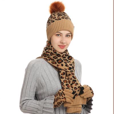 China COMMON Thickened Autumn/winter Knitted Hat Set Amazon's New Women's Leopard Print Warm Wool Hat Scarf And Gloves Three-piece For Women for sale