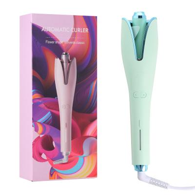 China Ceramic wholesale electric hair curler spin curling iron durable hair styling for hair. for sale