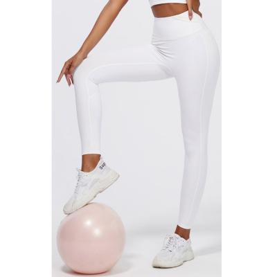 China Breathable No Seam Front T Line In The Front High Waist Rise V Shape Workout Gym White Yoga Pants for sale