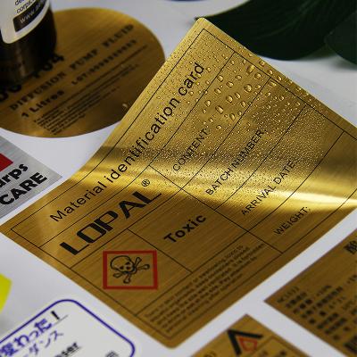 China Suitable for printing high quality adhesive waterproof packaging gold private label sticker for electronic device barcode for sale